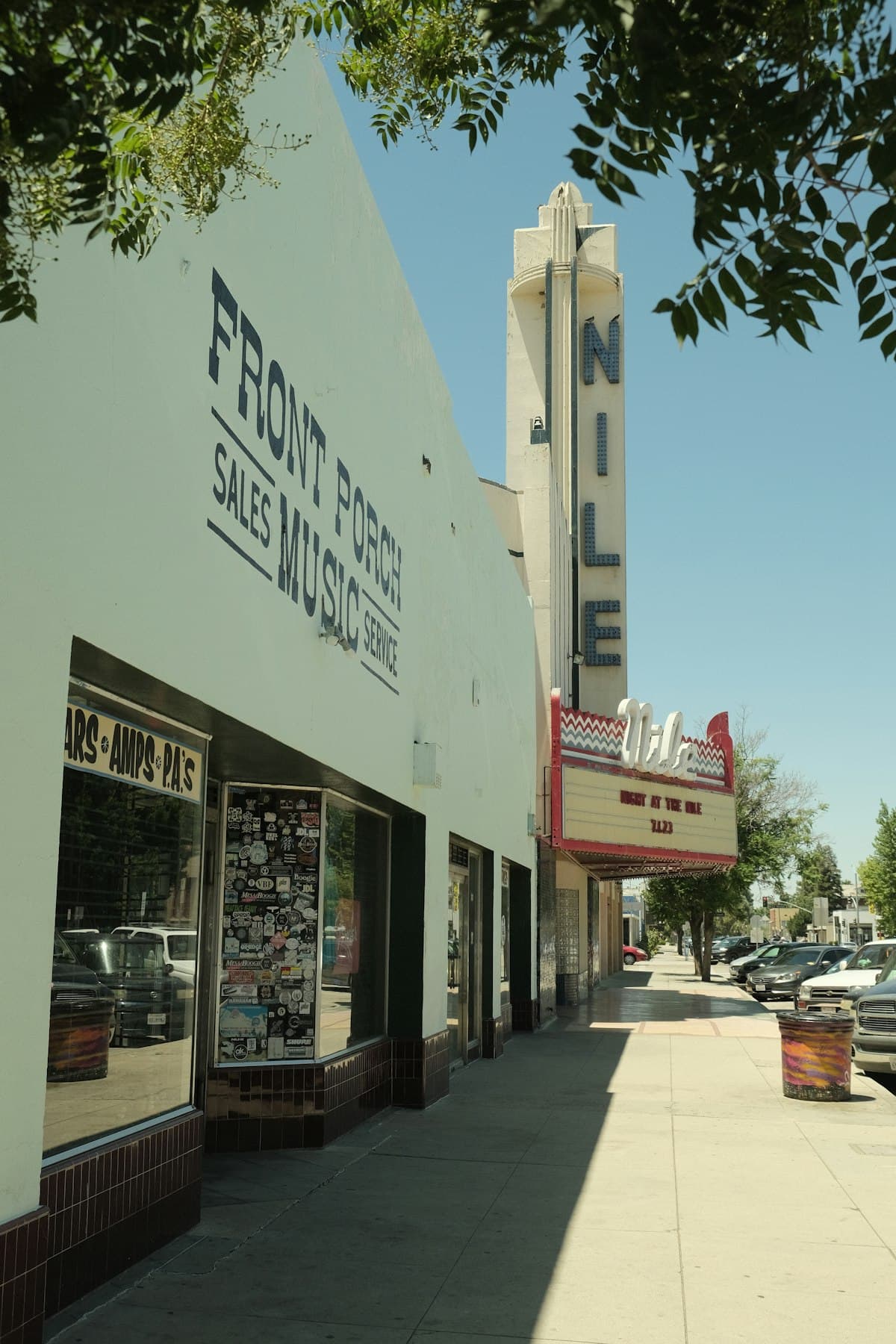 Nile Theatre and Front Porch Music store on a sunny day in downtown Bakersfield California