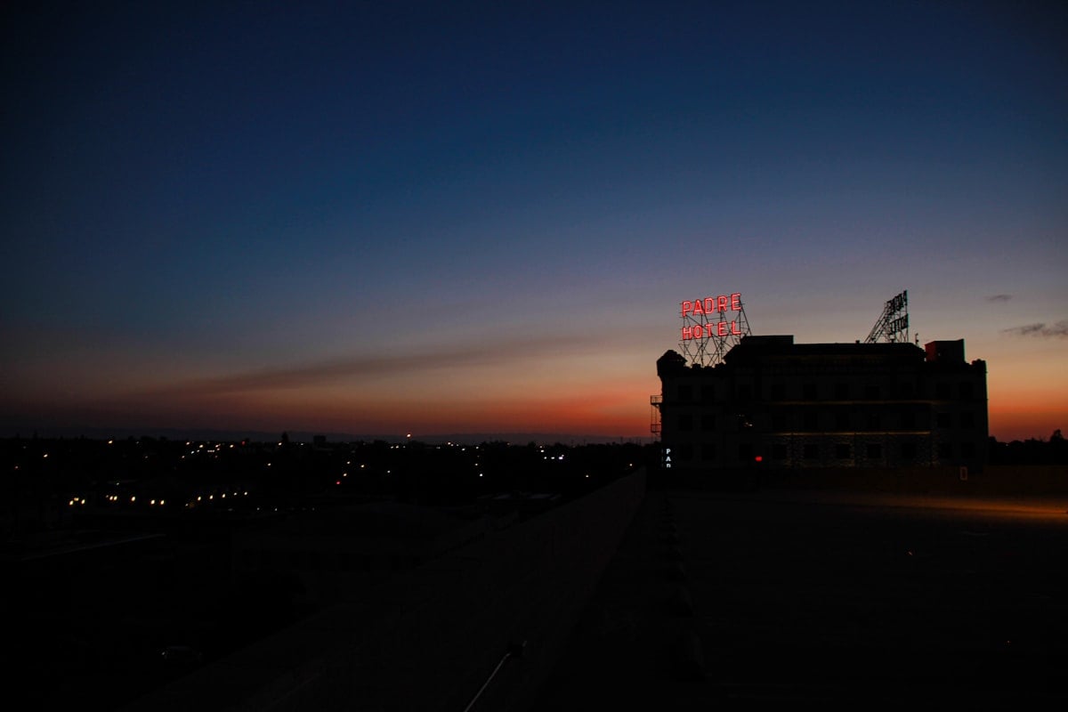 The Padre Hotel building silhouette at sunset in downtown Bakersfield California