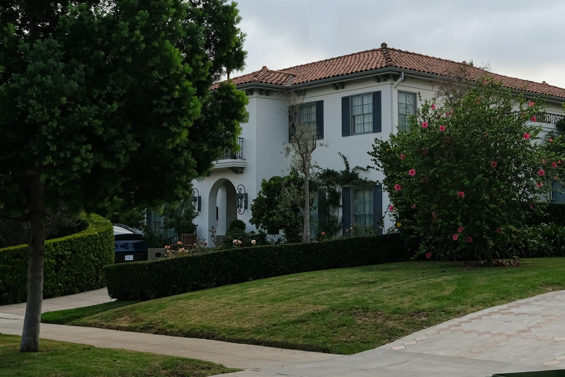 Mediterranean-style home with clay tile roof