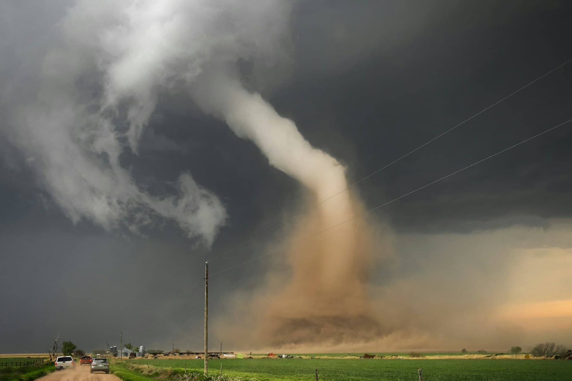 Dramatic dust storm approaching across desert landscape illustrating severe weather challenges