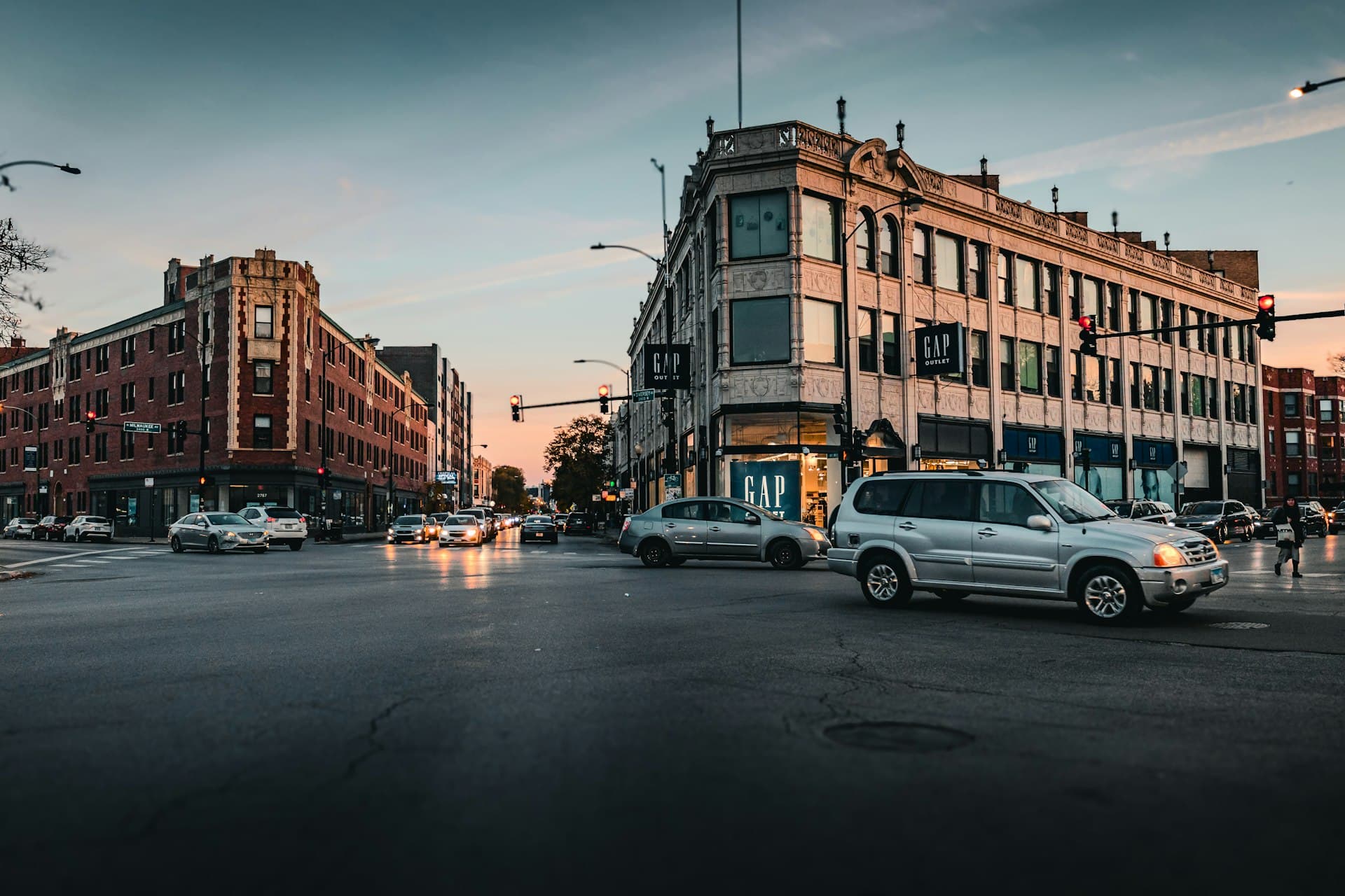 Logan Square Chicago street scene showing historic brick buildings and architecture at dusk