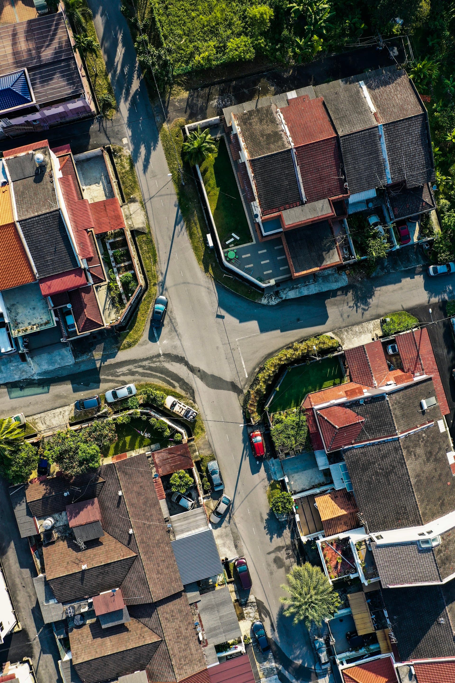 Aerial view of residential neighborhood showing rooftops and street layout