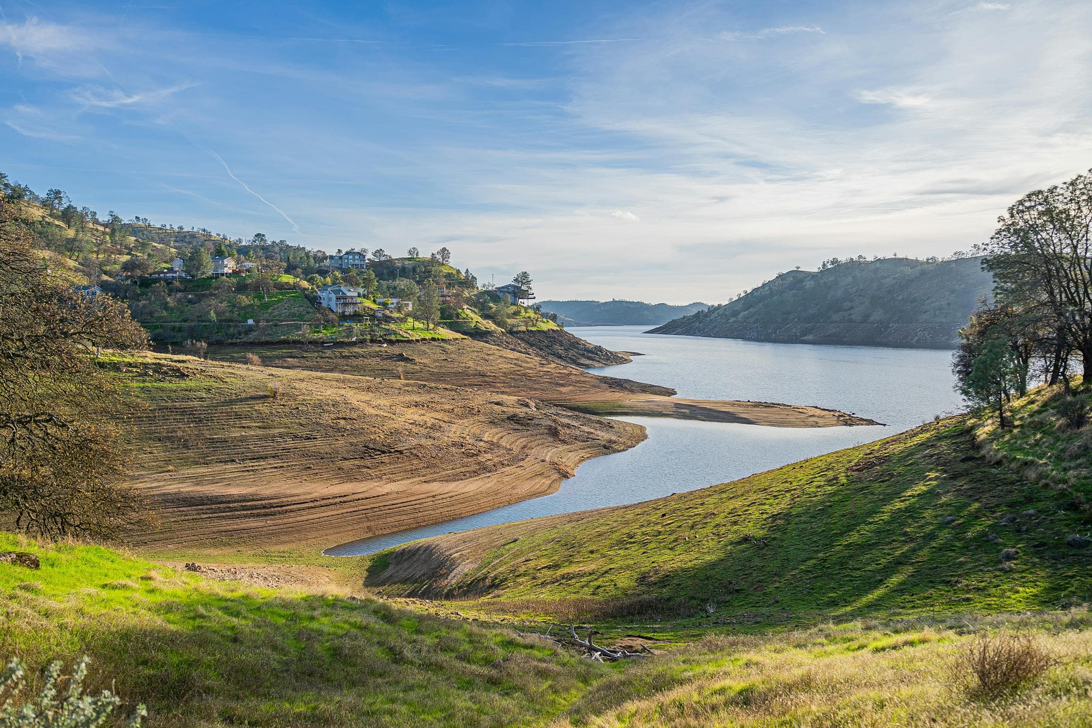 Millerton Lake near Fresno California with rolling hills and calm waters