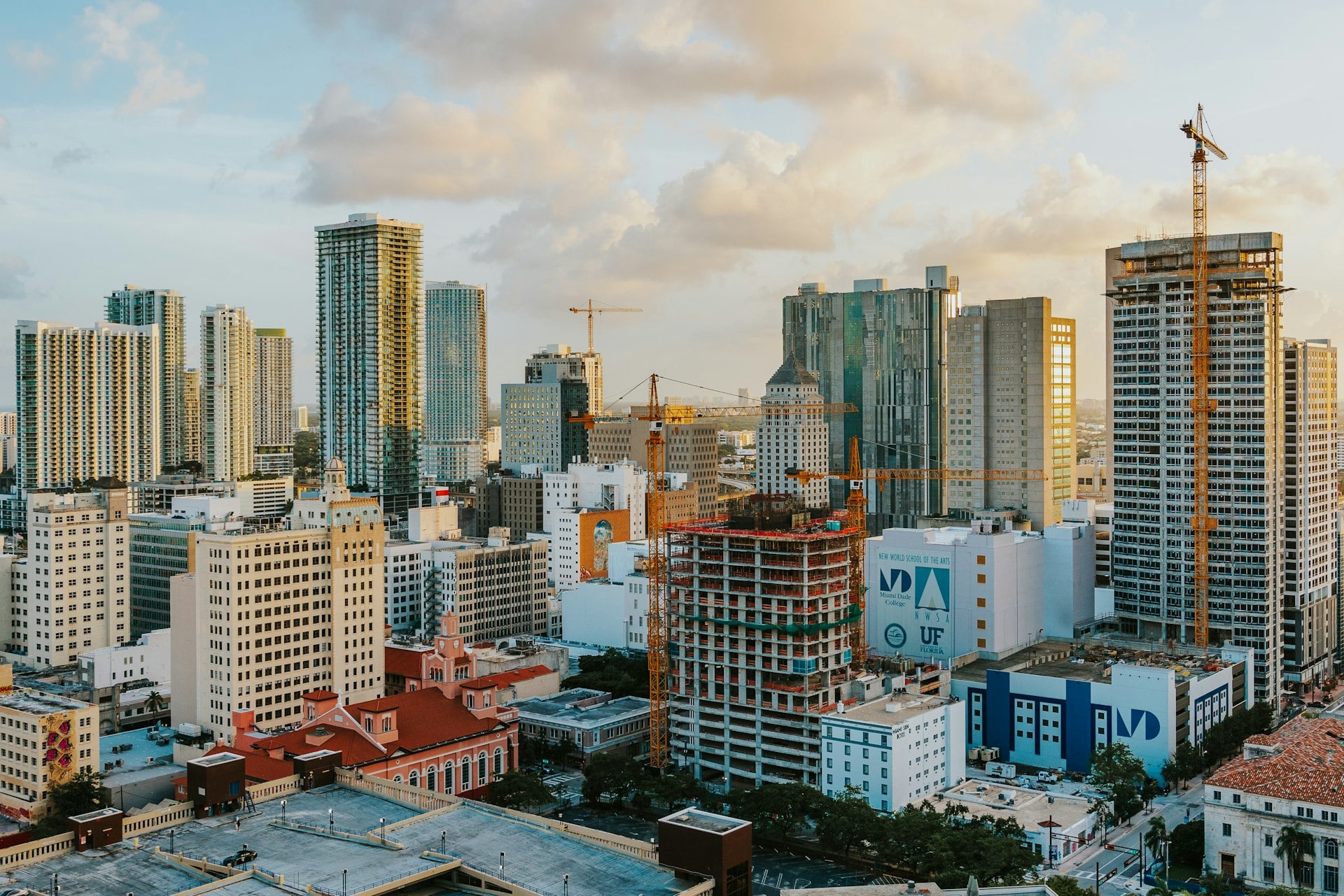 Downtown Miami skyline at golden hour showing mix of historic and modern architecture
