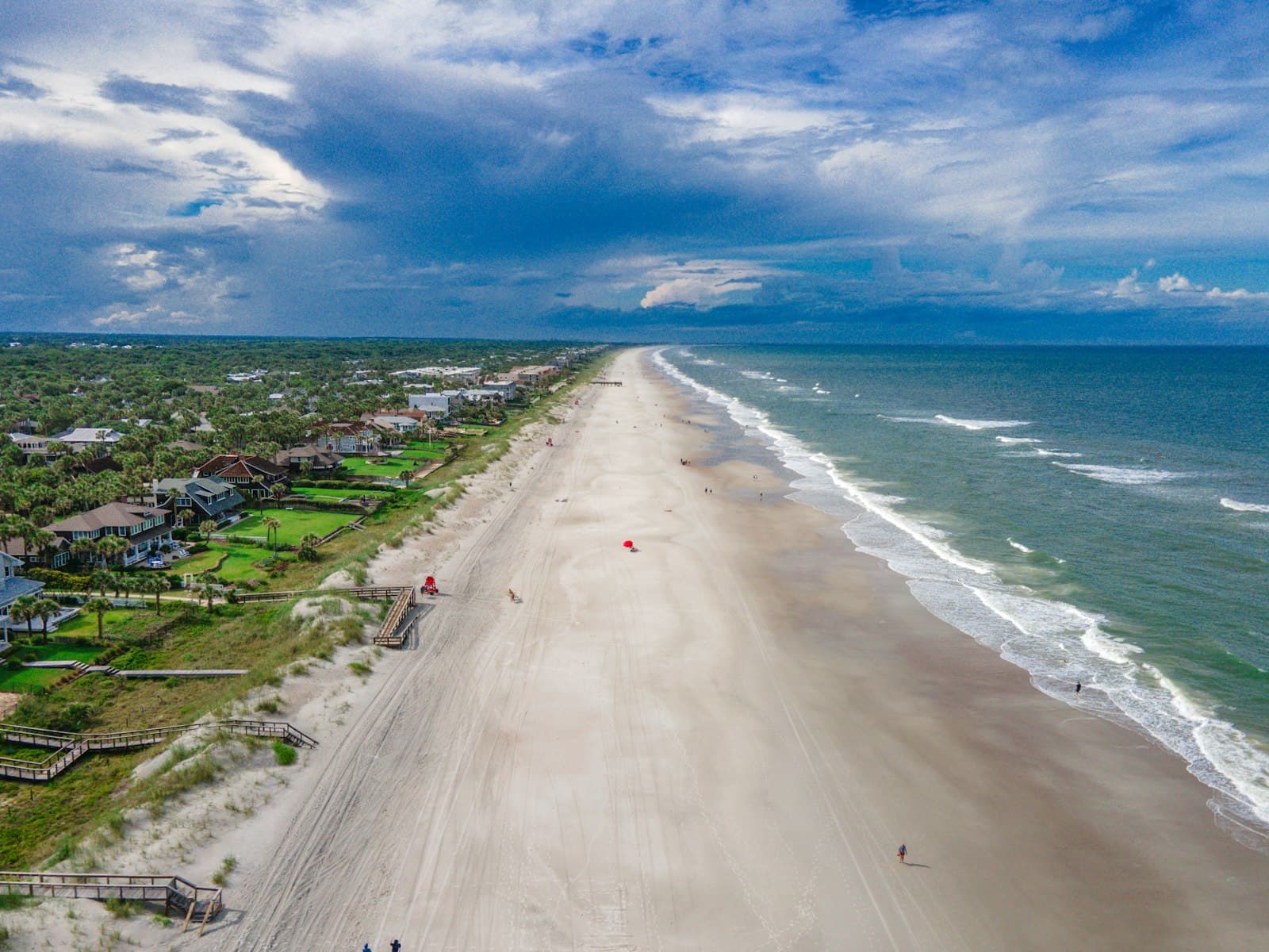 Aerial view of Jacksonville Beach coastline with beachfront homes and Atlantic Ocean