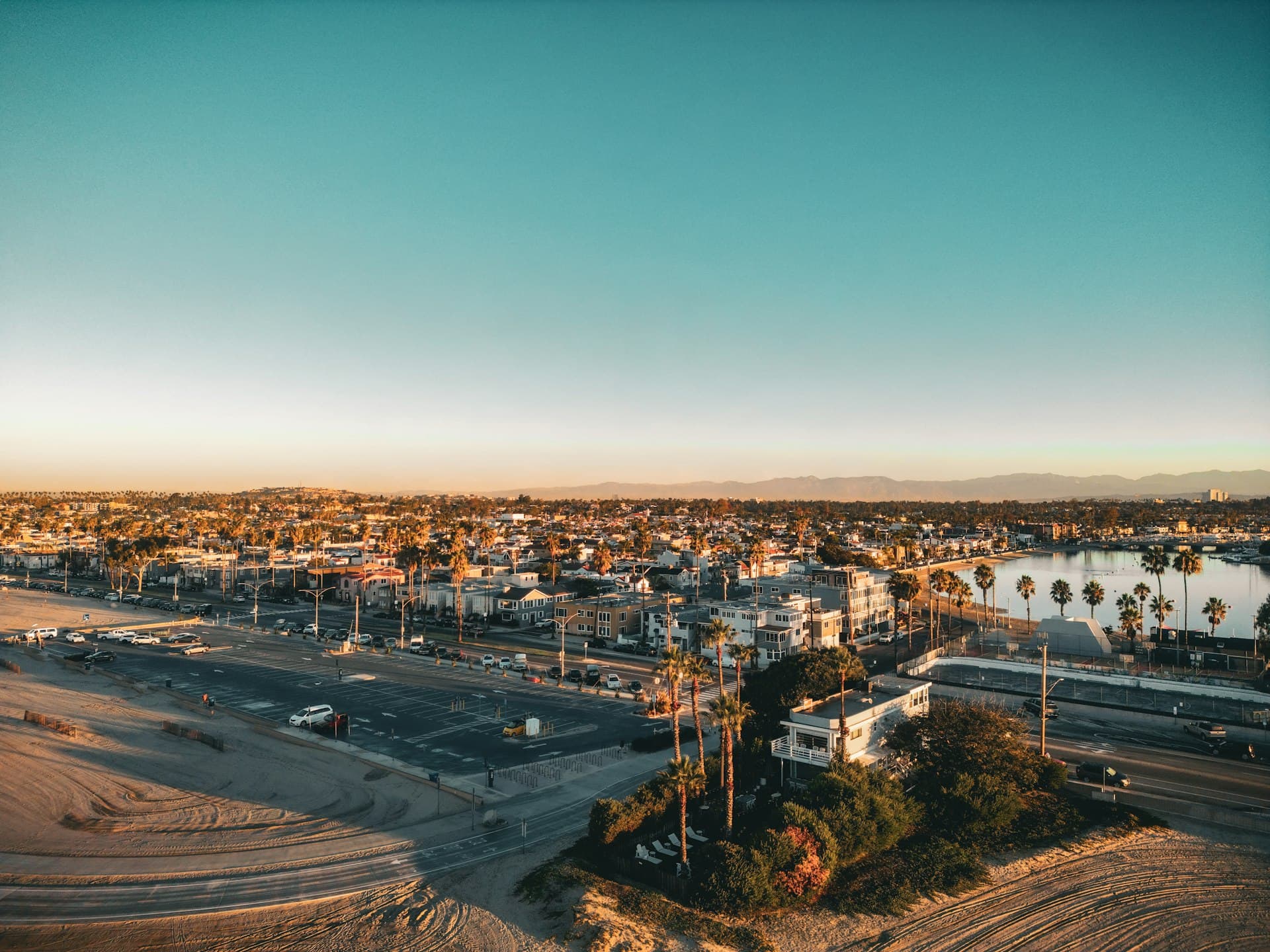 Aerial view of Long Beach California coastal residential area with palm trees