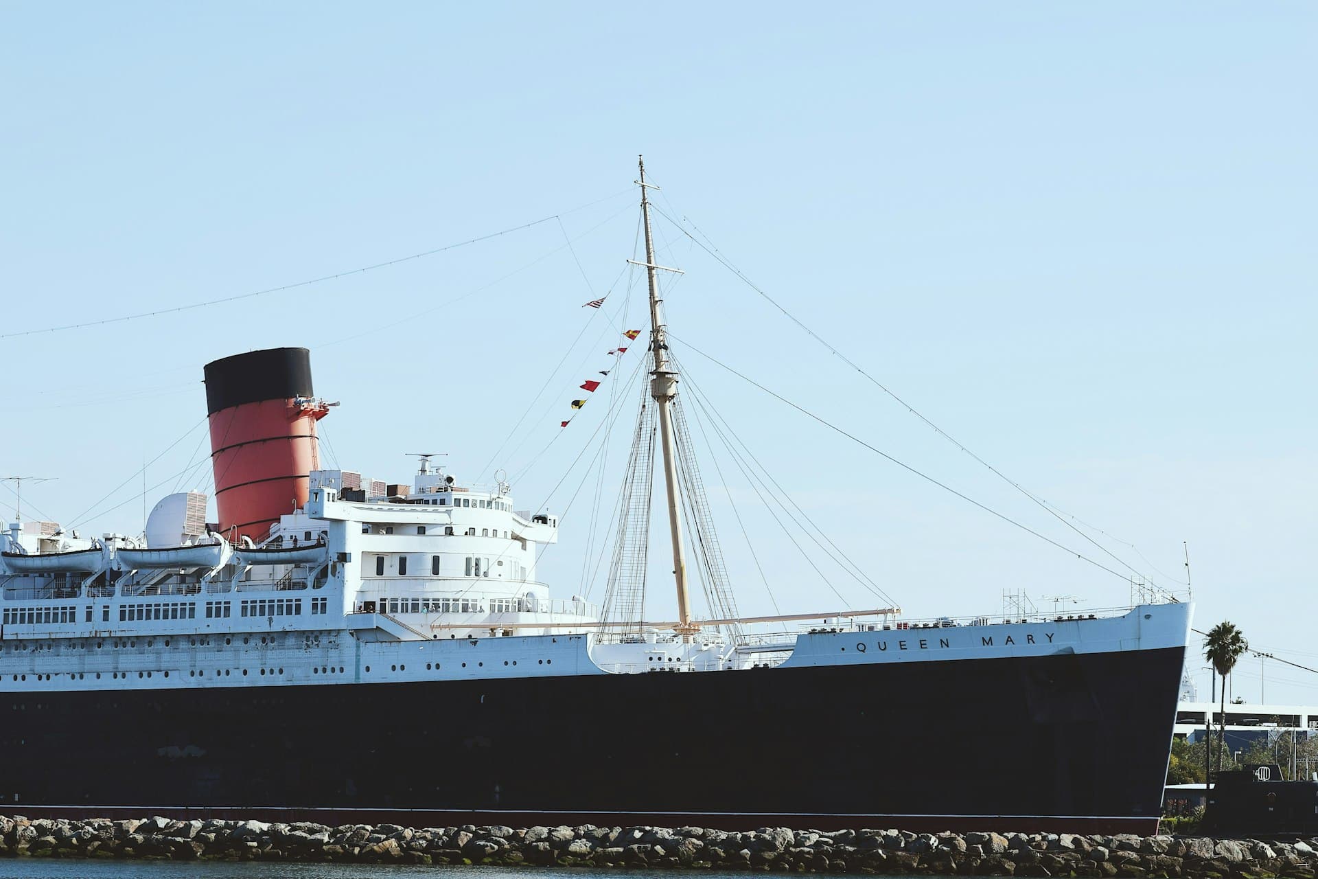 The Queen Mary ship docked in Long Beach California harbor
