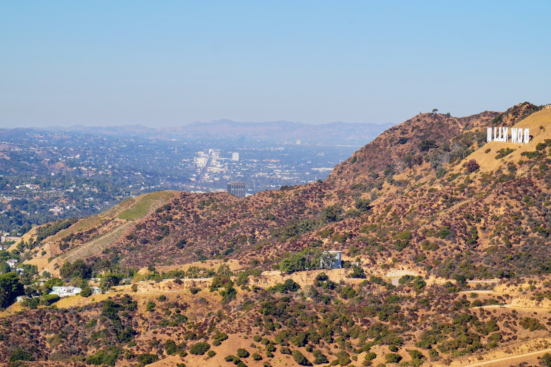 View of hillside home in Hollywood Hills Los Angeles with mountain backdrop