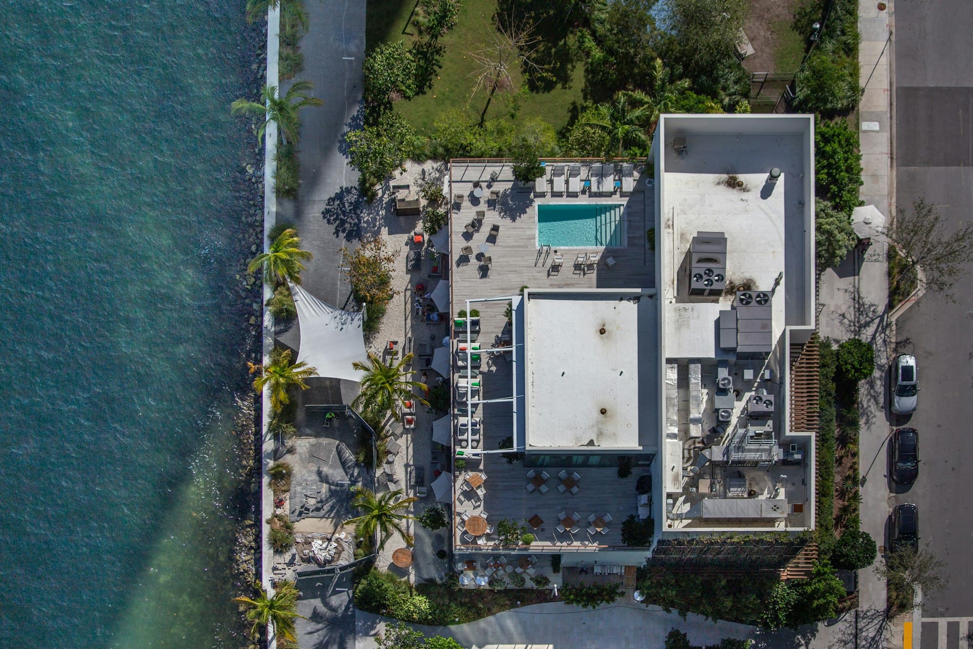 Aerial view of Miami waterfront property with flat roof near Biscayne Bay