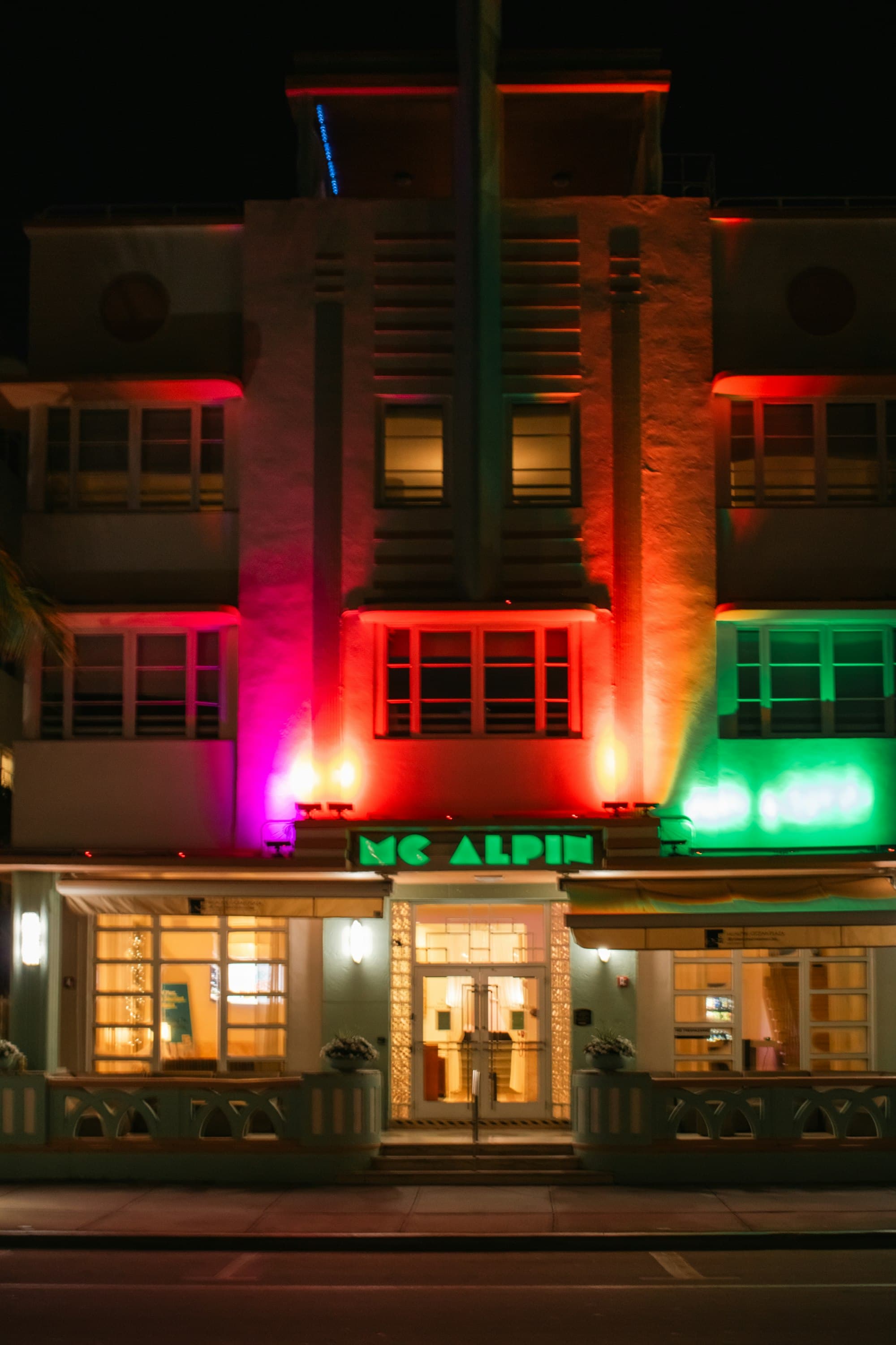 McAlpin Hotel Art Deco building illuminated at night on Ocean Drive Miami Beach