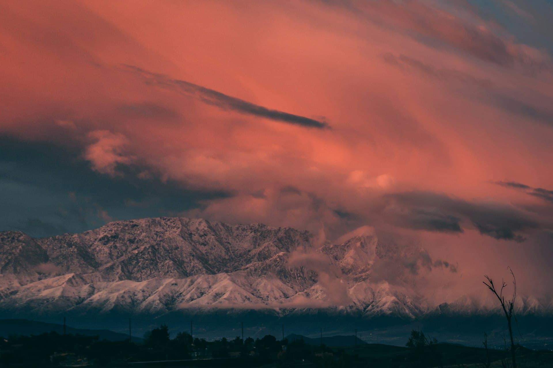 Snow-capped mountains at sunset viewed from Canyon Crest Riverside California