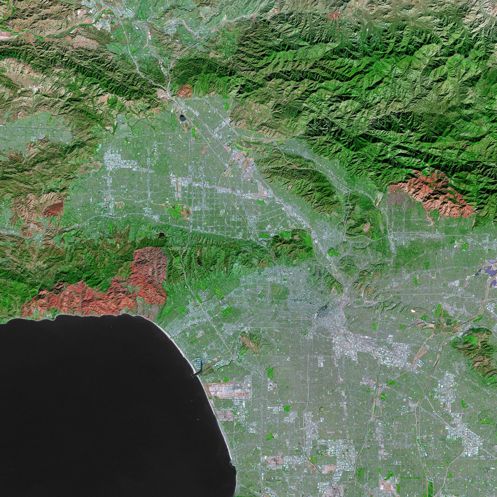Satellite view of Southern California showing wildfire burn scars from Santa Ana wind driven fires