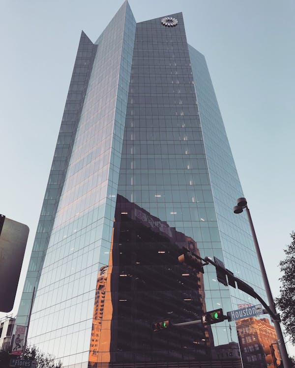 Frost Tower skyscraper reflecting sunset in downtown San Antonio, Texas