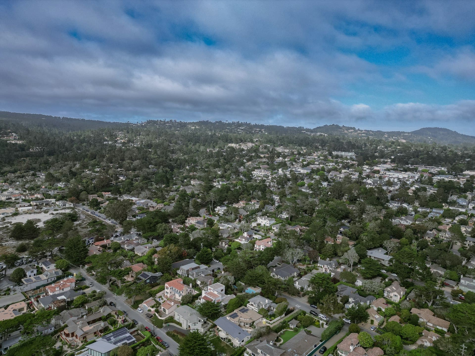 Aerial view of California residential neighborhood showing various roof types
