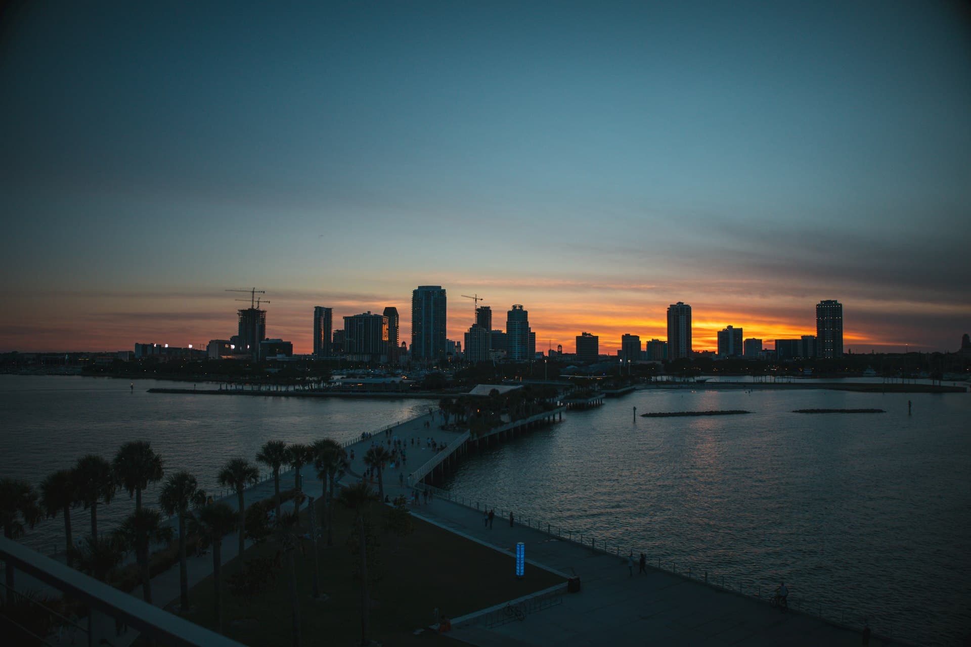 St. Petersburg Florida downtown skyline at sunset with waterfront and palm trees