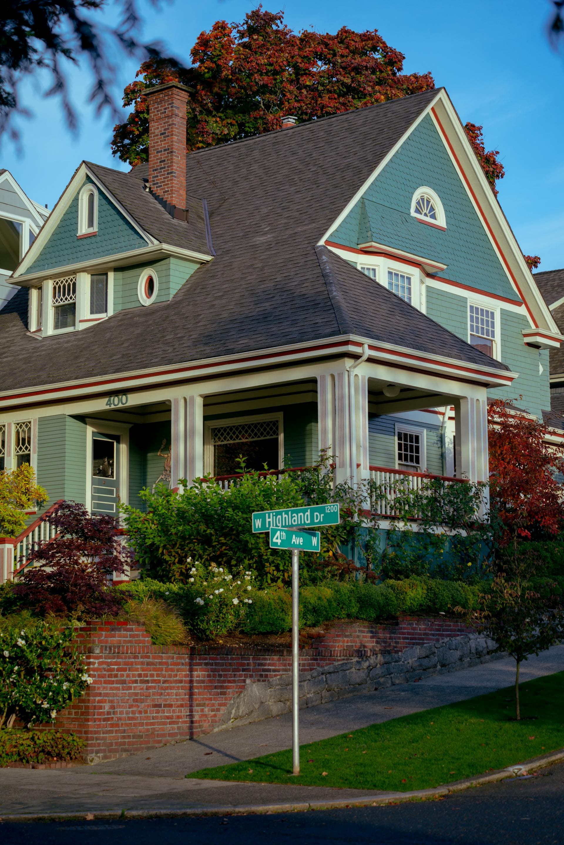 Classic Craftsman style home with prominent roof in Pacific Northwest neighborhood