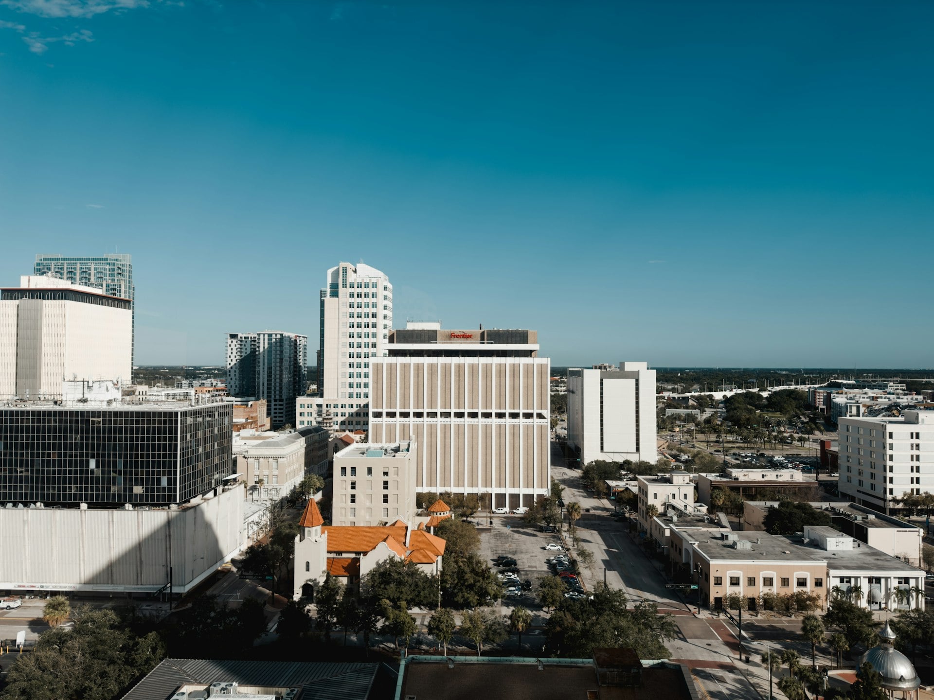 Downtown Tampa Florida skyline with high-rise buildings under blue sky